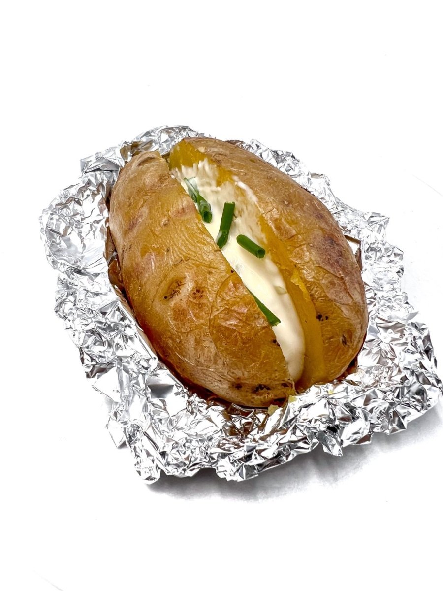 Pomme de terre au four avec une sauce ail et fines herbes - Santé gourmet Image